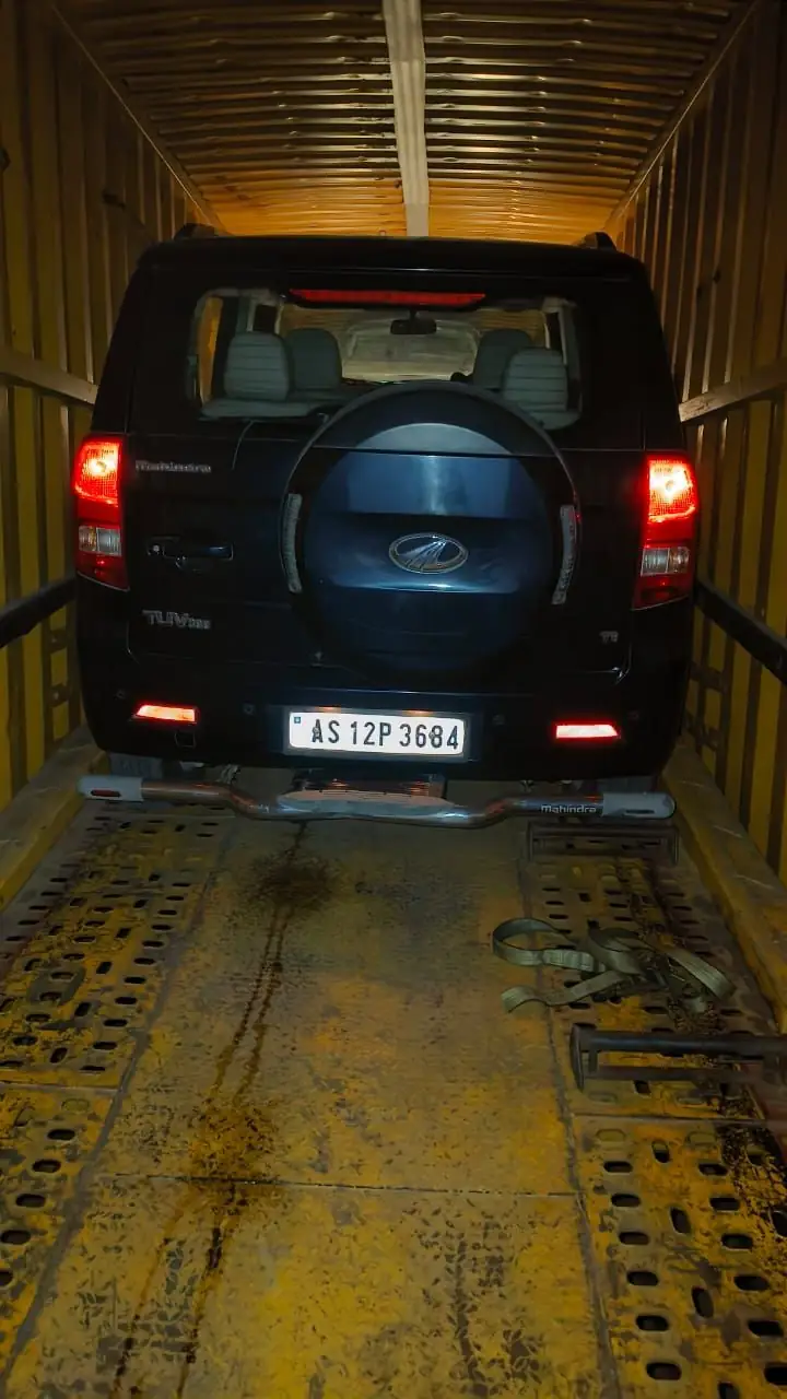 Black SUV inside a Spring Hill car carrier