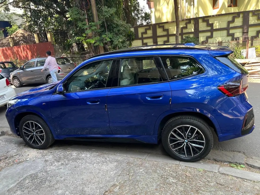 Blue SUV collected for door-to-door transport